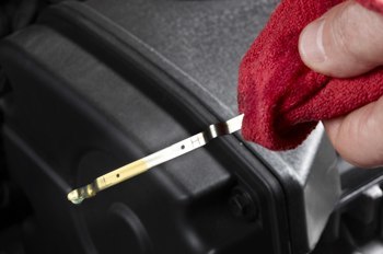 Why is engine oil milky brown?
